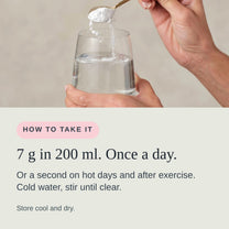 One 7 g scoop of Hydrate + Replenish being stirred into a glass of water.