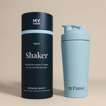 The MyPause steel shaker bottle beside its black gift tube.