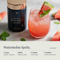 Watermelon Spritz recipe: one scoop of Hydrate + Replenish with 250 ml sparkling water, a splash of lime cordial and crushed watermelon, served over ice with mint.